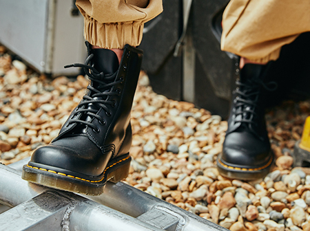 Dr Martens Issues Cautious Outlook, CEO to Step Down