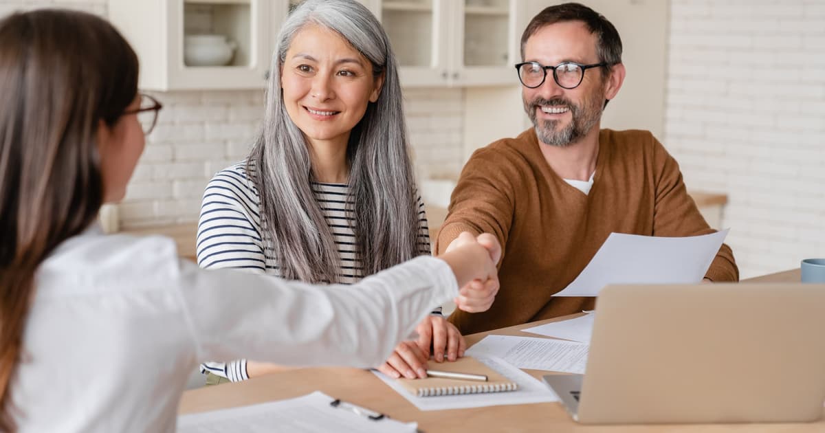 Financial consultation meeting between advisors and clients