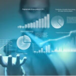 Person holding holographic financial charts and data visualizations