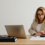 Financial planning documents and calculator on desk
