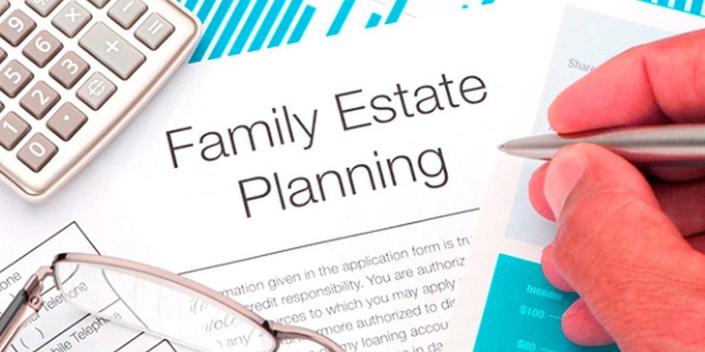 Family estate planning document with pen and calculator