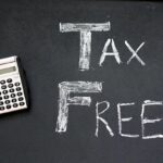 Tax free calculator on chalkboard