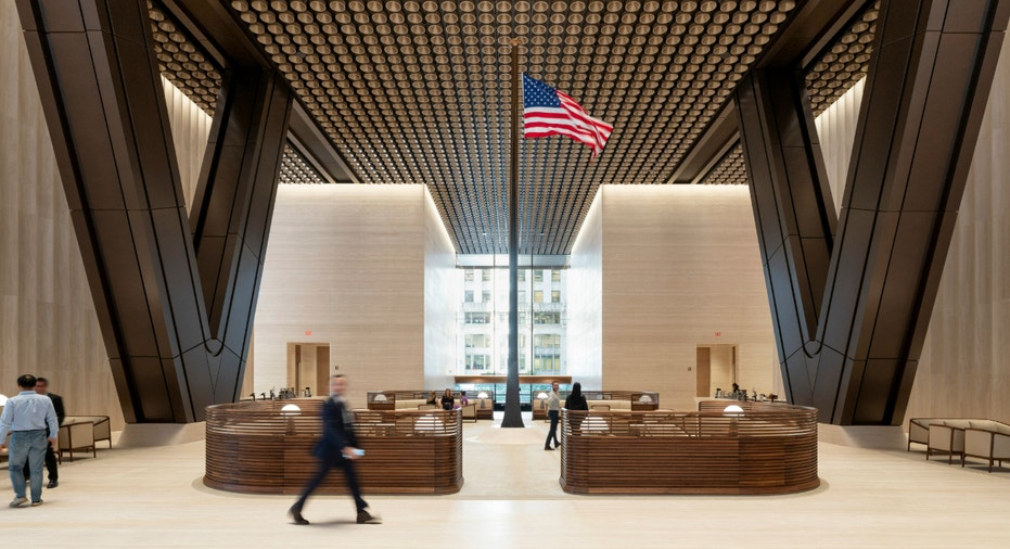 JPMorgan Chase trading floor with multiple screens showing financial markets data and analysis