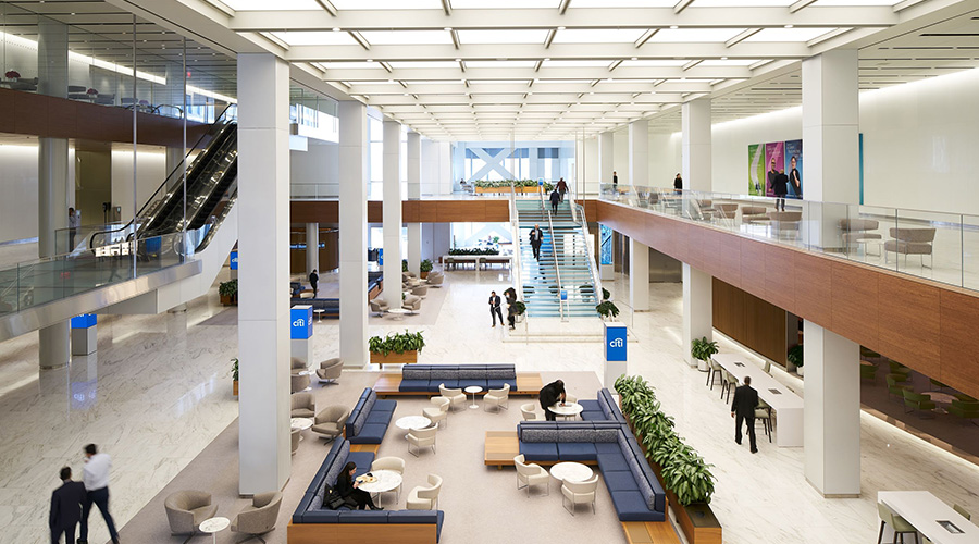 Modern Citigroup corporate headquarters atrium with employees