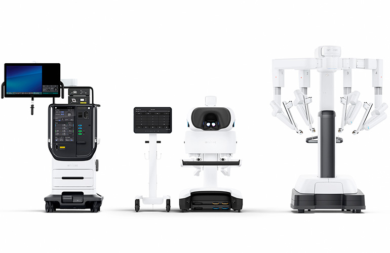Complete Intuitive da Vinci surgical ecosystem showing vision cart, surgeon console, and patient-side cart