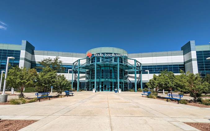 Texas Instruments corporate headquarters in Dallas, Texas, featuring the company's modern glass and steel campus facility