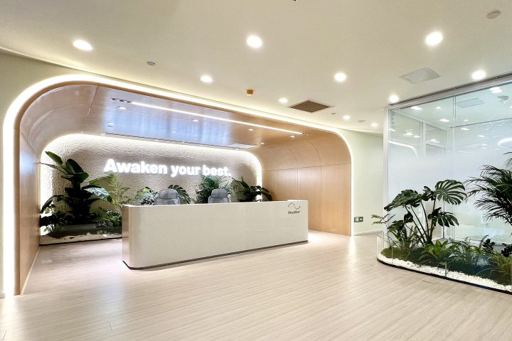 ResMed's modern reception area featuring the company's 'Awaken your best' branding, emphasizing their mission to improve sleep health and quality of life