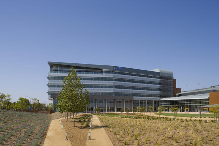ResMed's modern campus featuring sustainable landscaping and contemporary architecture, reflecting the company's commitment to innovation in sleep health technology