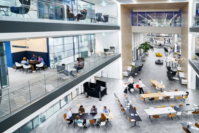 ARM office interior showing collaborative workspace with employees