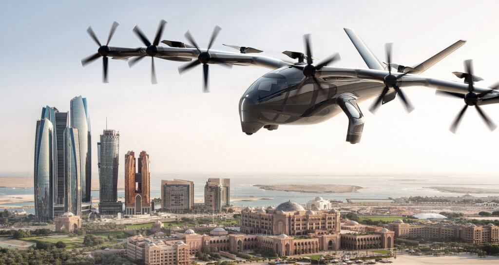 Archer Aviation's eVTOL aircraft flying over modern cityscape demonstrating urban air mobility