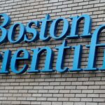 Boston Scientific company signage mounted on a brick building exterior