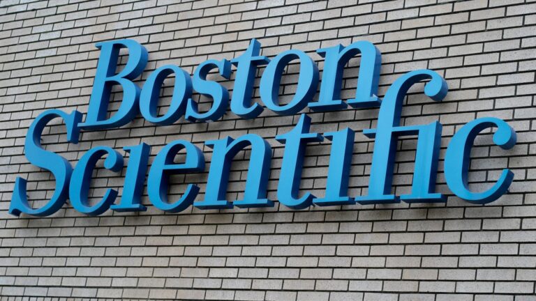 Boston Scientific company signage mounted on a brick building exterior