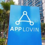 AppLovin (NASDAQ: APP) logo and stock chart