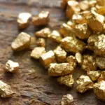 Close-up of raw gold nuggets, symbolising precious metals investment
