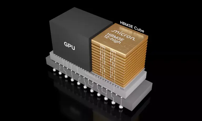 3D diagram of a Micron 12-high HBM3E memory cube, shown in gold, next to a GPU block on a shared substrate