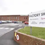 Portmeirion Group factory building and factory shop sign listing its Portmeirion, Spode, Royal Worcester and Pimpernel brands