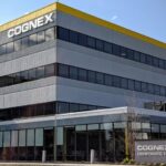 Exterior view of Cognex Corporation's corporate headquarters building with company signage.