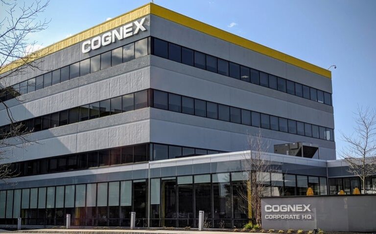 Exterior view of Cognex Corporation's corporate headquarters building with company signage.