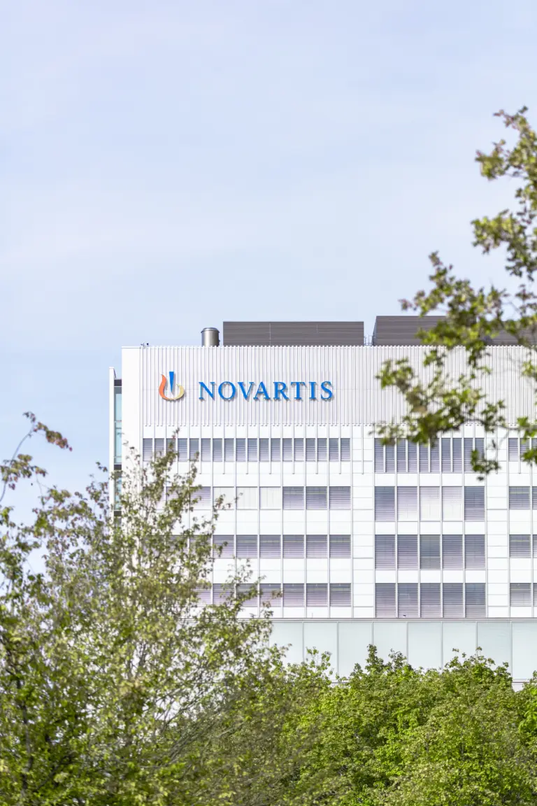 Novartis logo displayed on the Banting 1 building at the Novartis Campus in Basel, Switzerland