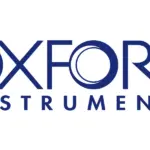 Oxford Instruments logo in dark blue letters on a white background