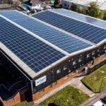 Aerial view of the Gooch & Housego (G&H) Torquay facility with solar panels covering its roof