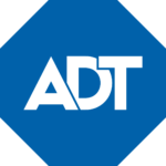 ADT logo: white ADT lettering on a blue octagon
